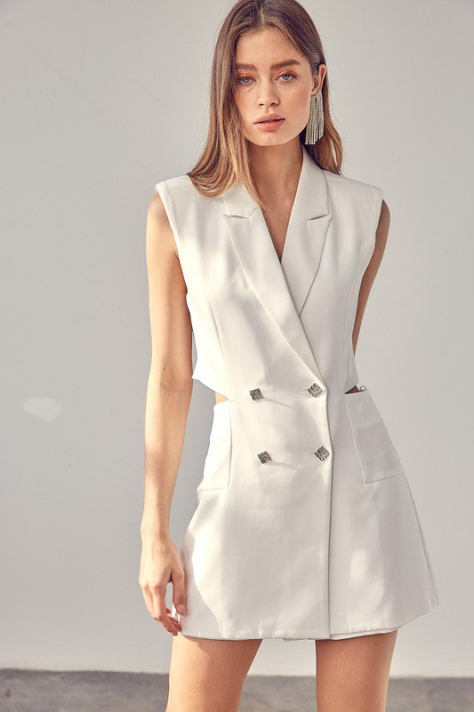 Blazer Button Romper in white, sleeveless with lapel neckline and button-up front, offers a chic and versatile look.