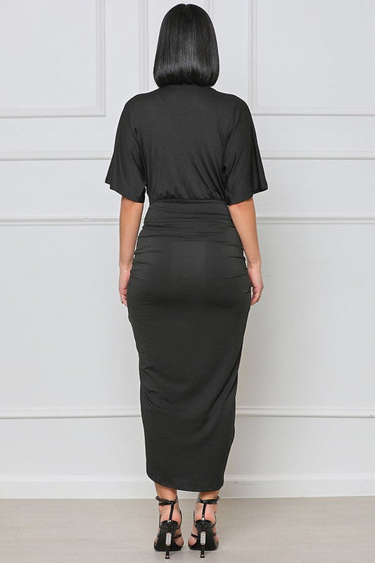 Envelopé Noir Silhouette Wrap Dress