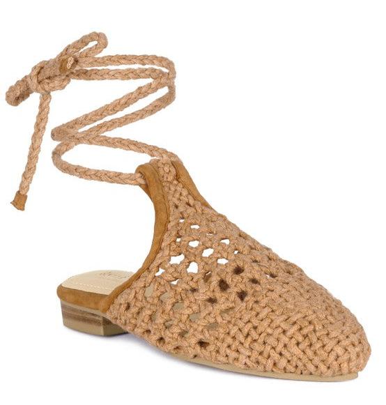 Handwoven cotton tie-up mule flats with flat heel and rubber sole.