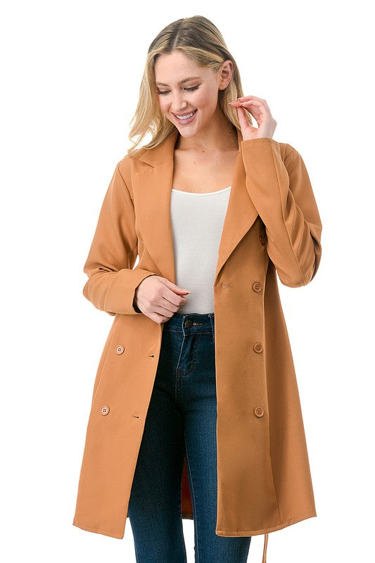 Oversized solid belted blazer with suit collar and long sleeves.