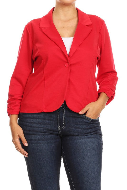 Plus size solid, waist length blazer with button closure and rucked sleeves.