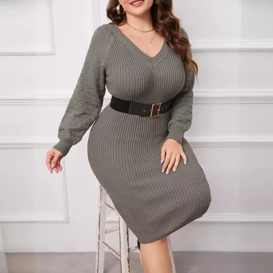 Elegant woolen V-neck knitted sweater dress with long sleeves and slim fit.