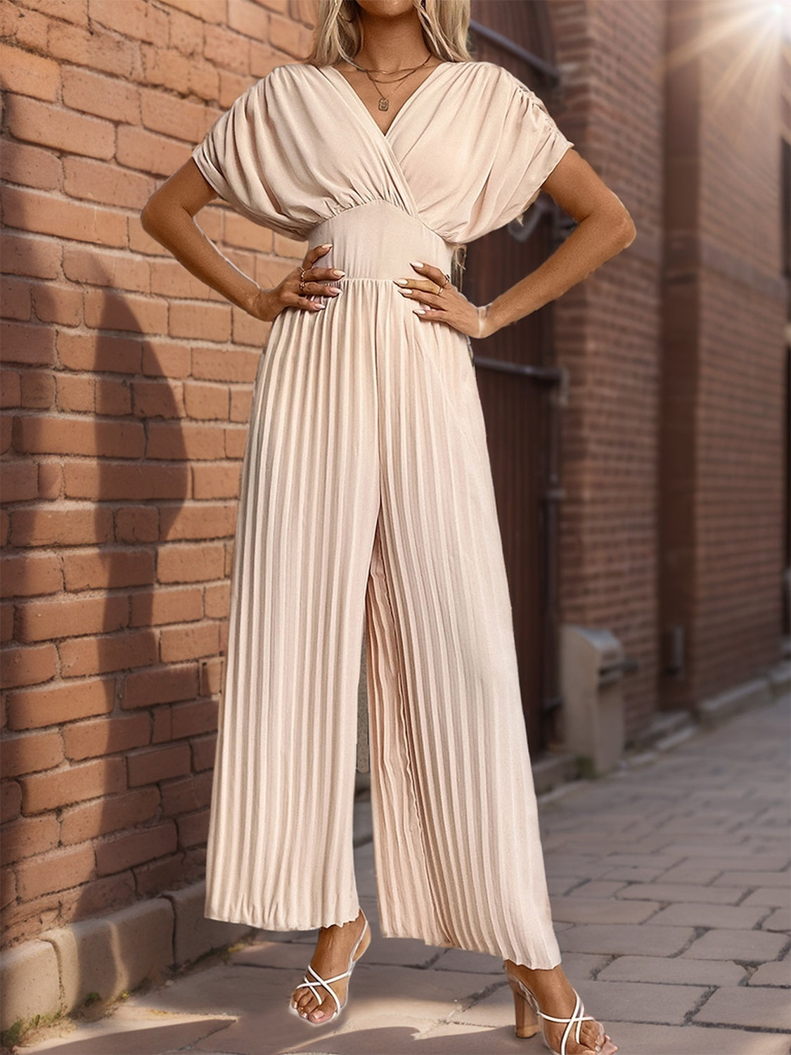 Perfee Pleated Short Sleeve Wide Leg Jumpsuit with ruched detailing and wide-leg design for a chic, comfortable fit.