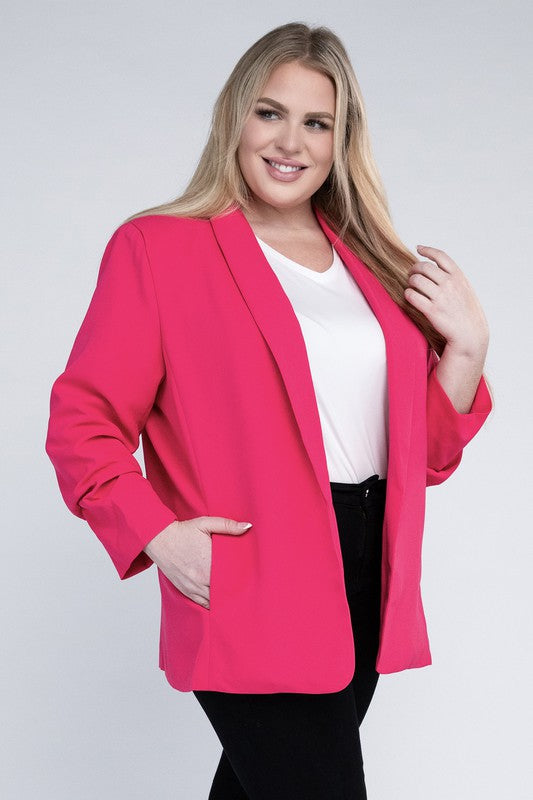 Plus-size woman wearing a hot pink shawl lapel blazer with side pockets and 3/4 sleeves.
