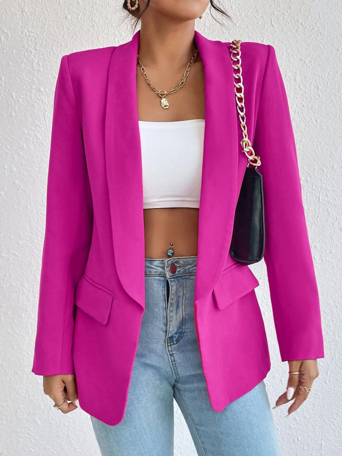 Shawl collar long sleeve blazer in vibrant pink worn over a white top and jeans.
